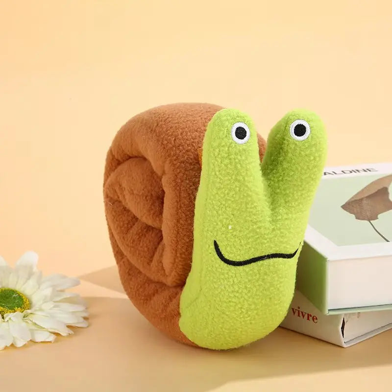 Snail shaped dog and cat toys, pet products, pet supplies, mats to hide food odors, training puzzles, and fun sniffing toys